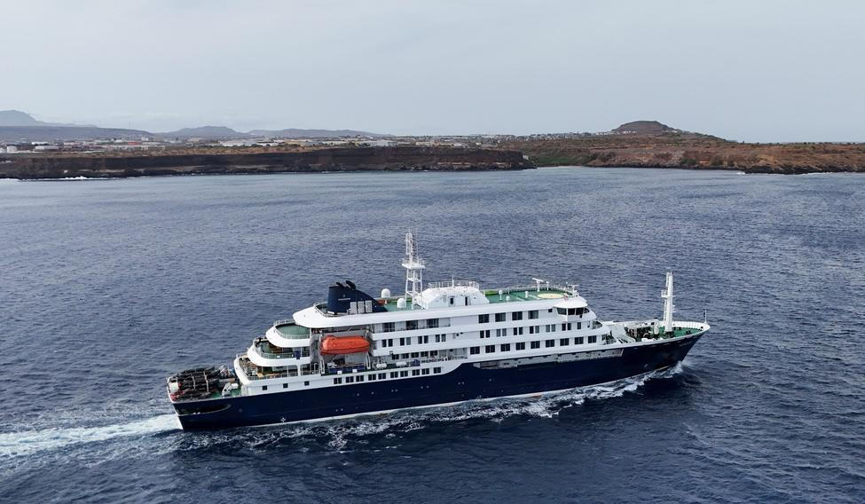 A drone view of the cruise ship MV Hondius, carrying passengers suspected of having cases of hantavirus on board, leaves Praia