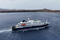 A drone view of the cruise ship MV Hondius, carrying passengers suspected of having cases of hantavirus on board, leaves Praia
