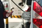 FILE PHOTO: Cars queue at gas stations ahead of an announced fuel price hike, in Beijing