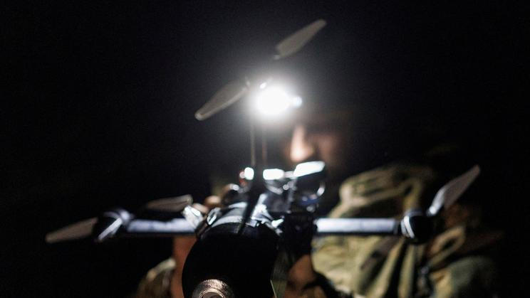 FILE PHOTO: Ukrainian serviceman prepares for a fly an FPV interceptor drone during his combat shift in Kharkiv region