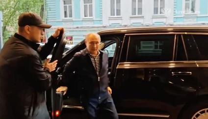 Russian President Vladimir Putin meets his former school teacher in Moscow
