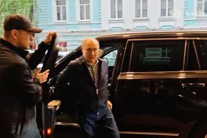 Russian President Vladimir Putin meets his former school teacher in Moscow