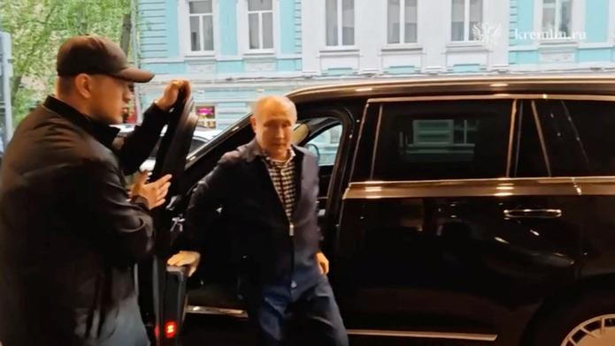 Russian President Vladimir Putin meets his former school teacher in Moscow
