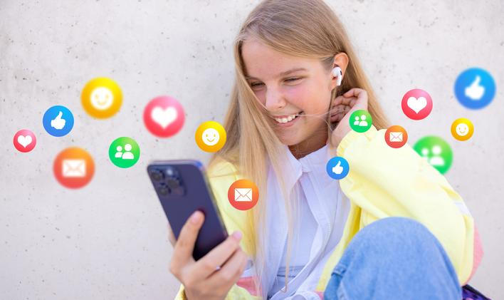 Teenage,Girl,Using,Social,Media,Apps,On,Mobile,Phone
