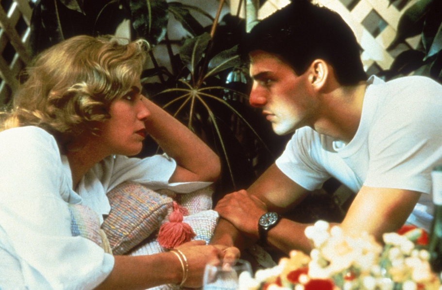 Kelly McGillisová jako Charlie a Tom Cruise coby pilot Maverick ve filmu Top Gun (1986).