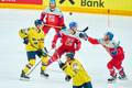 Libor Hajek CZE Nr. 55 Ondrej Beranek CZE Nr. 8 compete, zweikampf, fight for the puck against Joel Eriksson EK SWE Nr.