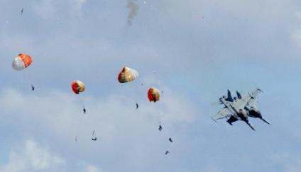 Military jets' crew members eject safely following a mid-air collision during the Idaho air show outside Mountain Home Air Force Base in Idaho