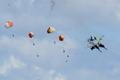 Military jets' crew members eject safely following a mid-air collision during the Idaho air show outside Mountain Home Air Force Base in Idaho