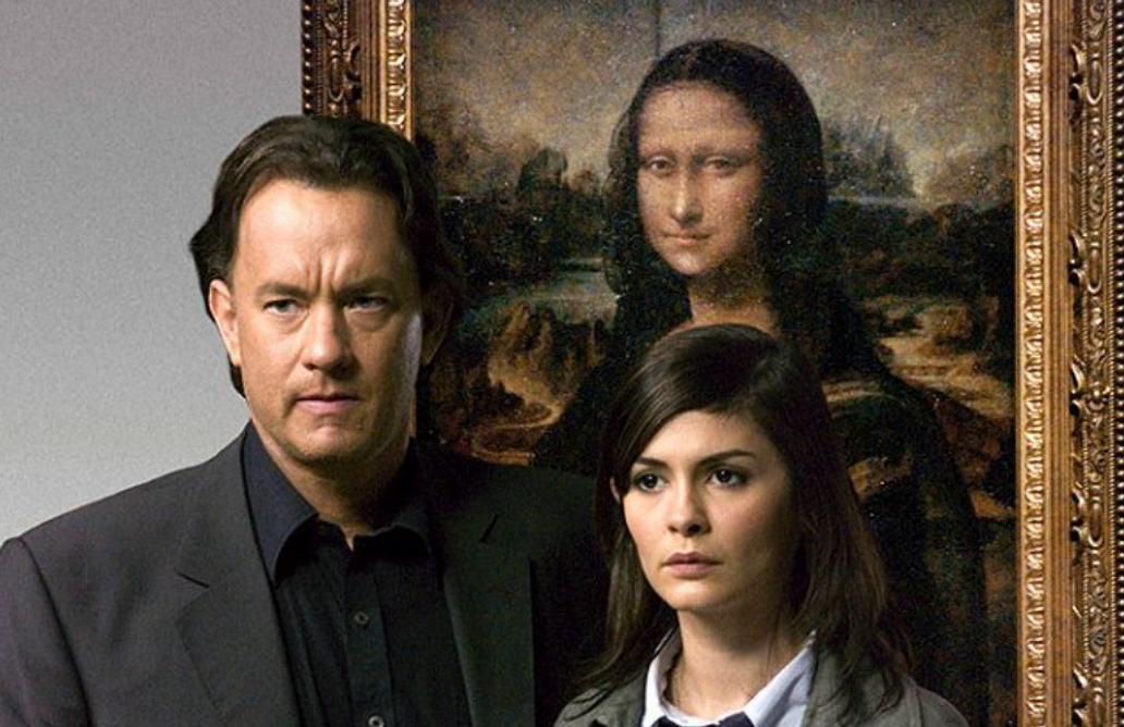 Tom Hanks v roli odborníka na symboly Roberta Langdona a Audrey Tautou jako francouzská kryptoložka Sophie Neveu ve filmu Šifra mistra Leonarda (2006). 
