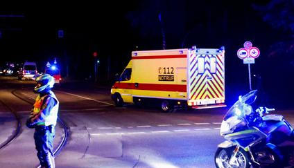 An ambulance believed to be carrying an American health worker, who has been brought to Germany for treatment after contracting Ebola in the Democratic Republic of Congo, arrives at the Charite University Hospital in Berlin
