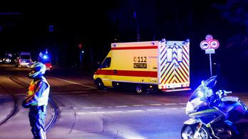 An ambulance believed to be carrying an American health worker, who has been brought to Germany for treatment after contracting Ebola in the Democratic Republic of Congo, arrives at the Charite University Hospital in Berlin