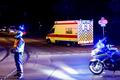 An ambulance believed to be carrying an American health worker, who has been brought to Germany for treatment after contracting Ebola in the Democratic Republic of Congo, arrives at the Charite University Hospital in Berlin