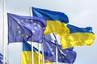 FILE PHOTO: Ukrainian and European flags fly in central Kyiv