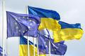 FILE PHOTO: Ukrainian and European flags fly in central Kyiv