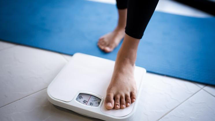 Lose,Weight.,Fat,Diet,And,Scale,Feet,Standing,On,Electronic