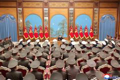 North Korean leader Kim Jong Un meets with division and brigade commanders of the entire army