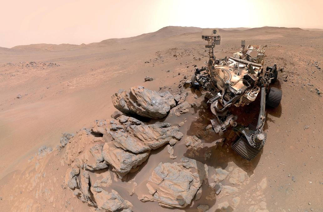 NASA's Perseverance rover takes a self-portrait against a sweeping backdrop of ancient Martian terrain