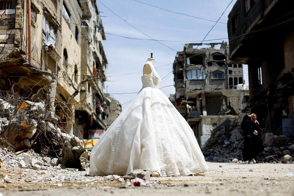 Gaza brides turn to refurbish old wedding dresses amid soaring prices and shortages