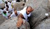 Muslim pilgrims gather at Mount of Mercy on the plain of Arafat during the annual hajj pilgrimage, outside the holy city of Mecca