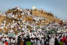 Muslim pilgrims gather at Mount of Mercy on the plain of Arafat during the annual hajj pilgrimage, outside the holy city of Mecca