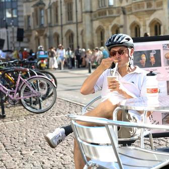 People enjoy hot weather as temperatures climb over the bank holiday weekend during a heatwave, in Cambridge