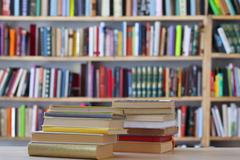 Stack,Of,Books,On,Wooden,Table,In,Library,,Education,,Stack