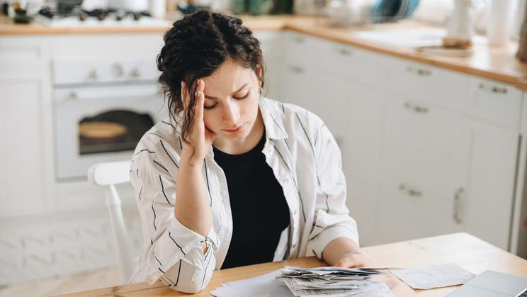 Stressed,Caucasian,Woman,Trying,To,Deal,With,Financial,Documents,,Having
