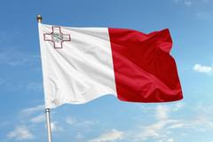 The,Flag,Of,Malta,Is,Shown,Waving,In,The,Wind,