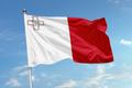 The,Flag,Of,Malta,Is,Shown,Waving,In,The,Wind,