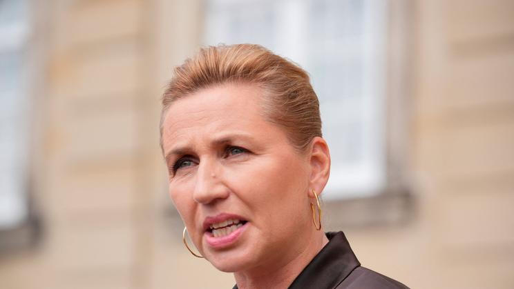 Denmark's acting Prime Minister Frederiksen meets members of the media after her visit to the King at Amalienborg Palace in Copenhagen