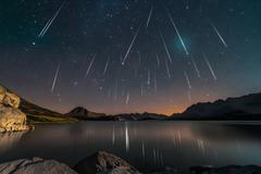 Perseids,Meteor,Shower,And,The,Milky,Way,Silhouette,In,The