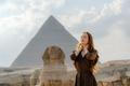 Young,Redhead,Woman,Standing,In,Front,Of,The,Great,Sphinx