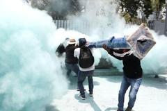 Teachers from Mexico's CNTE union protest for higher wages, in Mexico City