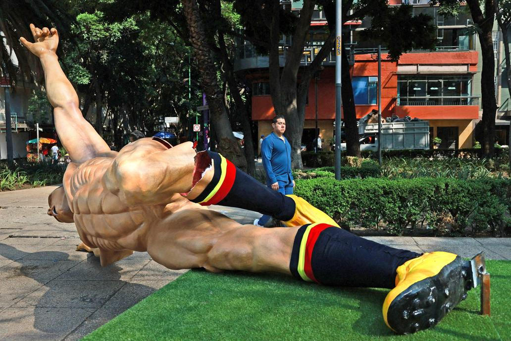 Statues of soccer players placed along Avenida Reforma for the 2026 FIFA World Cup, which were vandalized by CNTE teachers demanding better wages and pensions, in Mexico City