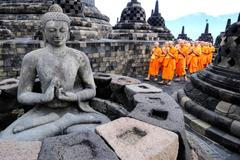 Buddhist monks take part in a circumambulation ritual at Borobudur Temple, the world's largest Buddhist temple, ahead of Vesak Day, marking the birth, enlightenment, and death of Buddha, in Magelang