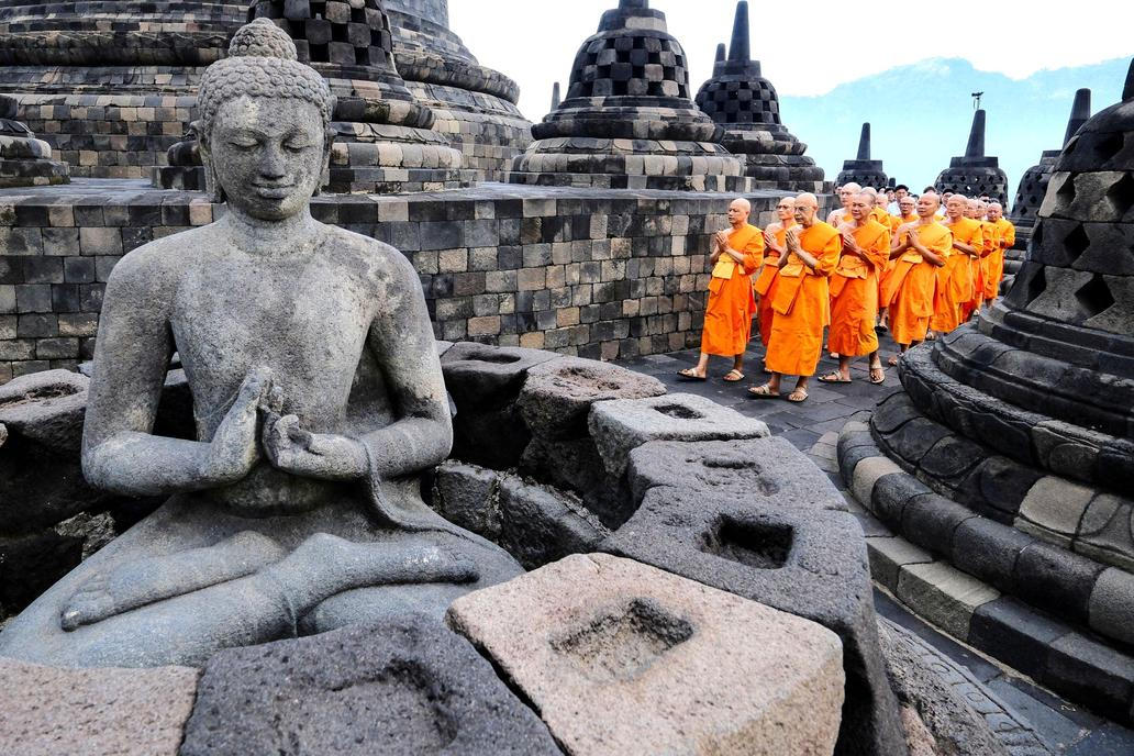 Buddhist monks take part in a circumambulation ritual at Borobudur Temple, the world's largest Buddhist temple, ahead of Vesak Day, marking the birth, enlightenment, and death of Buddha, in Magelang