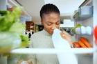 Black,Woman,,Fridge,Or,Smell,With,Expired,Milk,At,House