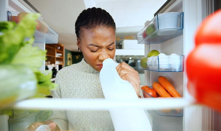 Black,Woman,,Fridge,Or,Smell,With,Expired,Milk,At,House