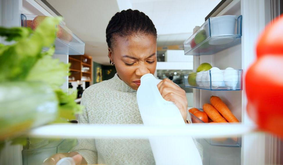 Black,Woman,,Fridge,Or,Smell,With,Expired,Milk,At,House