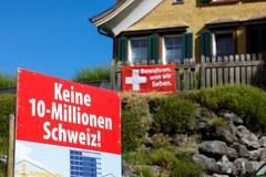 Swiss vote on proposal to cap population at 10 million