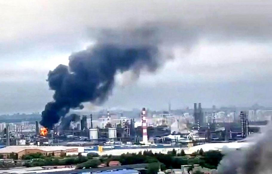 Smoke rises following what the authorities say is a Ukrainian drone strike in Moscow