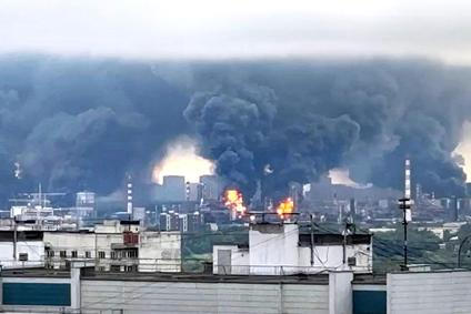 Smoke rises following what the authorities say is a Ukrainian drone strike in Moscow