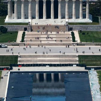 Workers refill the Lincoln Memorial Reflecting Pool in Washington
