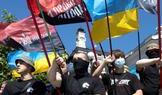 Protesters march denouncing an LGBT+ event in Kyiv