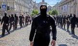 Protesters march denouncing an LGBT+ event in Kyiv