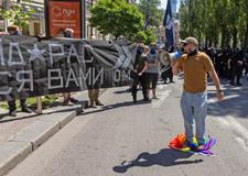 Protesters march denouncing an LGBT+ event in Kyiv