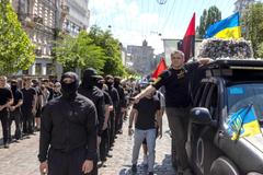 Protesters march denouncing an LGBT+ event in Kyiv
