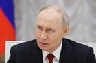 Russia's President Putin meets with service members in Moscow