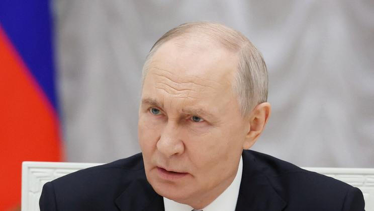 Russia's President Putin meets with service members in Moscow