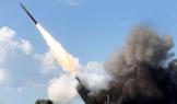 Ukrainian servicemen fire a High Mobility Artillery Rocket System (HIMARS) towards Russian troops near the frontline in Donetsk region